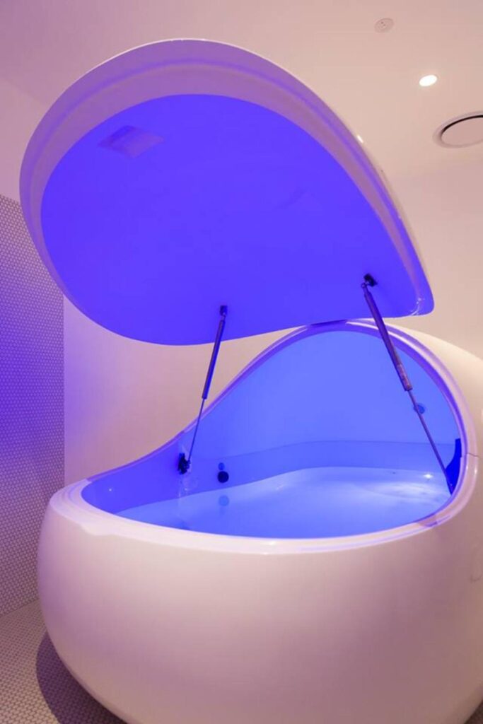Abstract purple and pink light therapy visuals at a wellness center