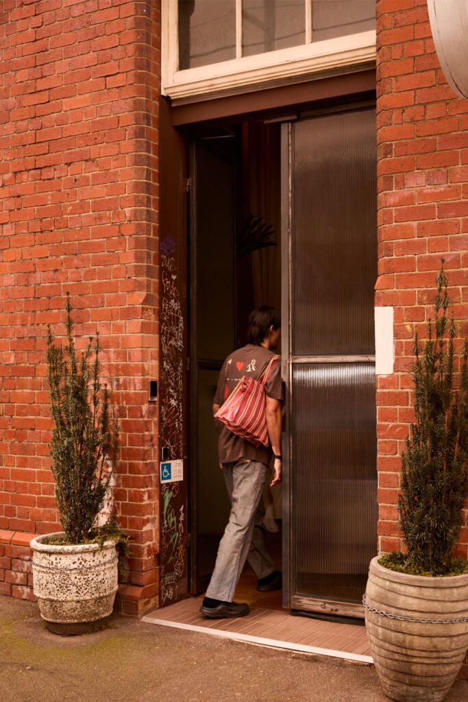 Warm brick and copper interior design at Sense of Self wellness center