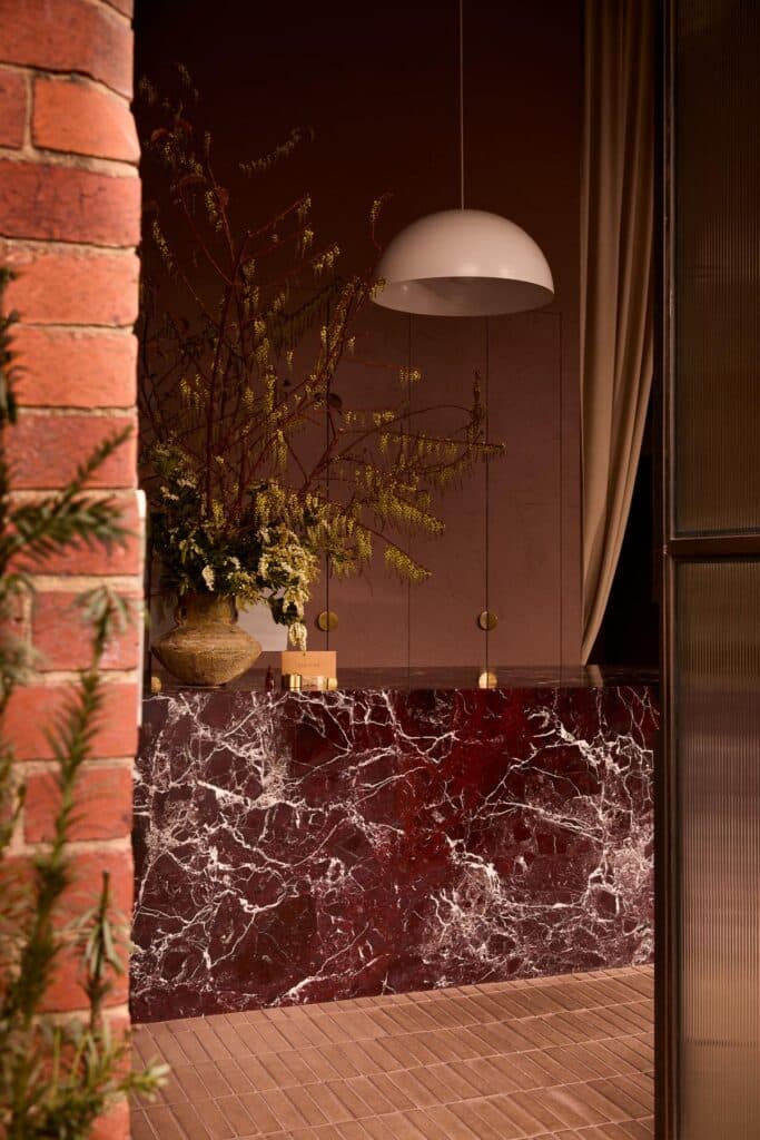 Communal bathing area with copper fixtures at Sense of Self Melbourne