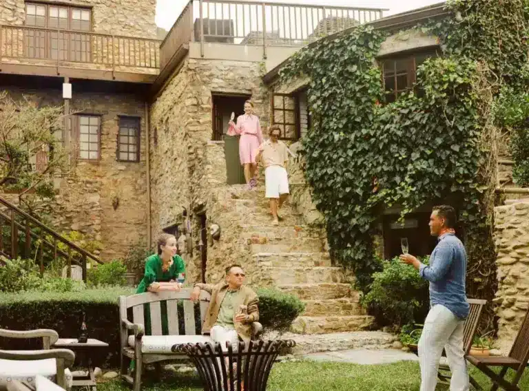 Couple smiling together at their Behind the Stay boutique hotel