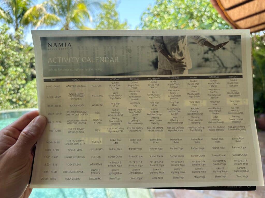 Namia weekly activity calendar listing complimentary wellness classes, Namia River Retreat, Hoi An, Vietnam